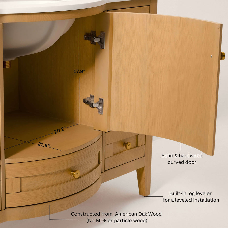 Lauren bathroom vanity showing solid hardwood construction, oval basin, and curved door detail in Sienna finish.