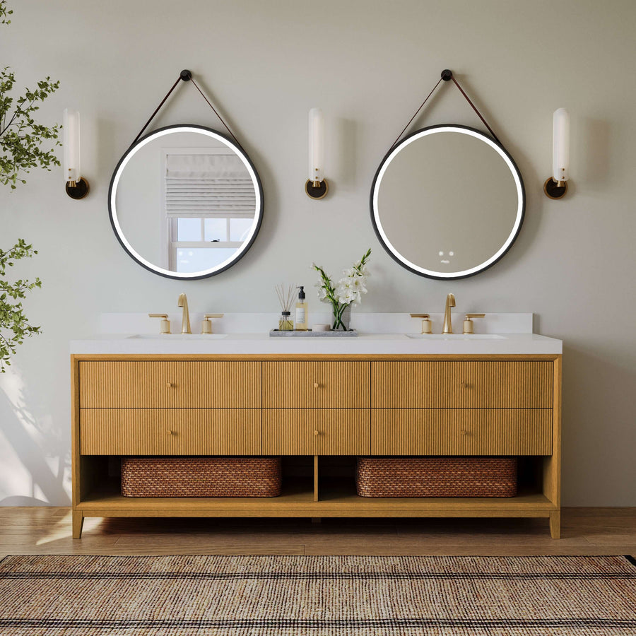 Momo bathroom vanity collection in Sienna finish featuring a white quartz countertop and round mirrors.