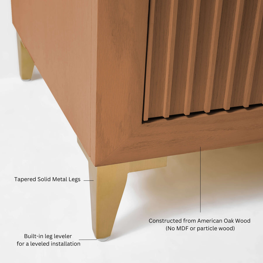 Turlington Bathroom Vanity showing tapered solid metal legs and oak wood detailing.