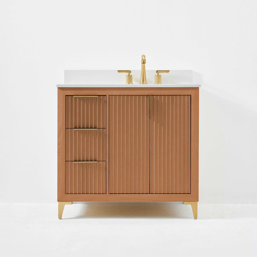 Turlington bathroom vanity in Sienna finish with sleek White Quartz countertop and gold-toned hardware.